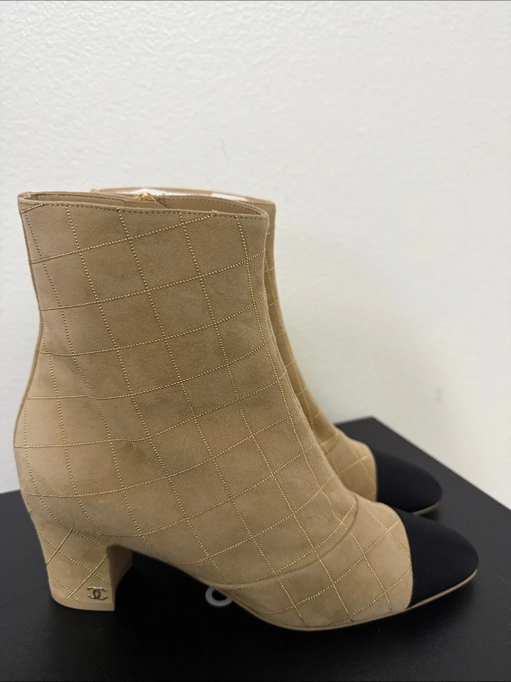 CHANEL Beige Quilted Ankle Boots with Black Cap Toe